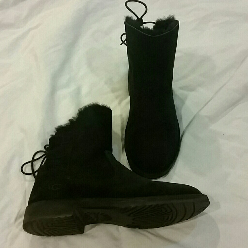 Black uggs with ties up the back